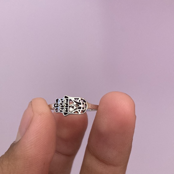 This ring is normal size and it’s silver - Picture 3 of 4